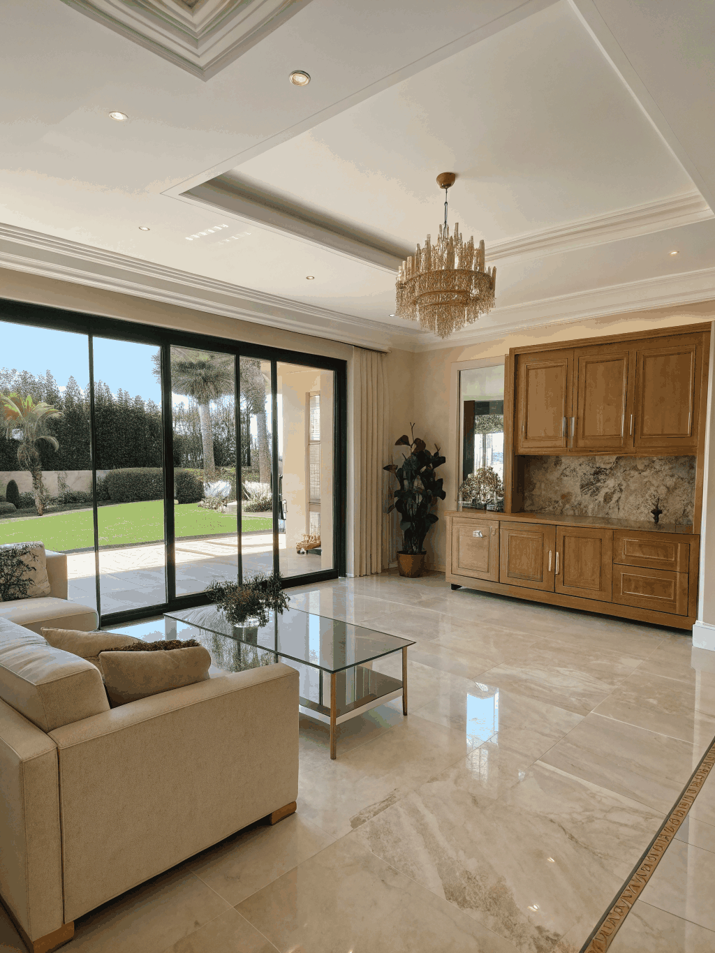 Professional photographer capturing a luxury villa interior for an Airbnb listing