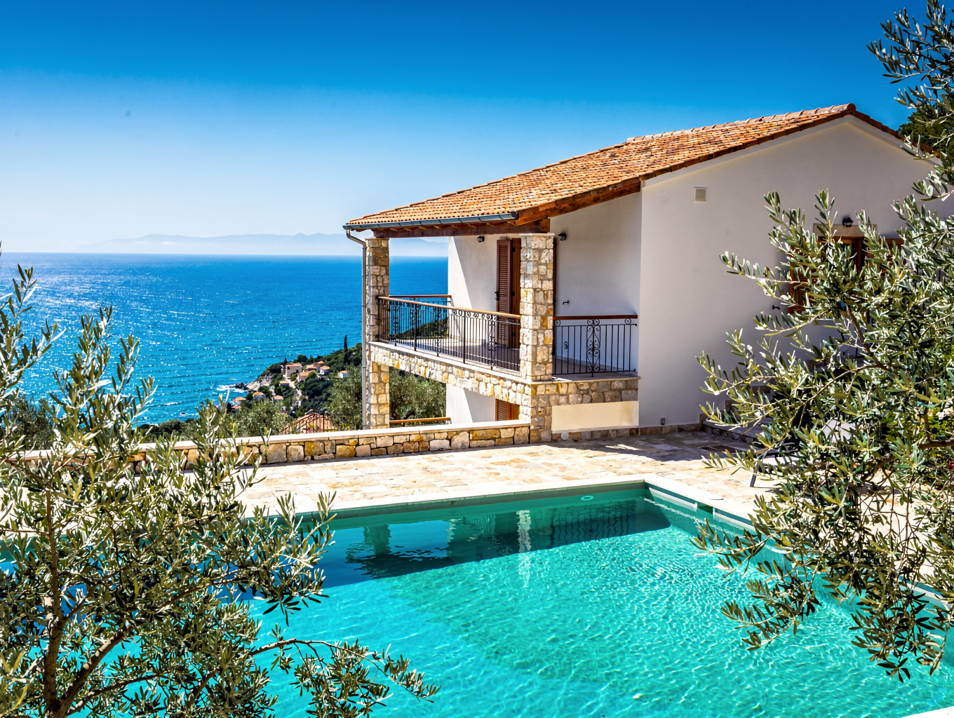 Mediterranean holiday home with olive garden and patio